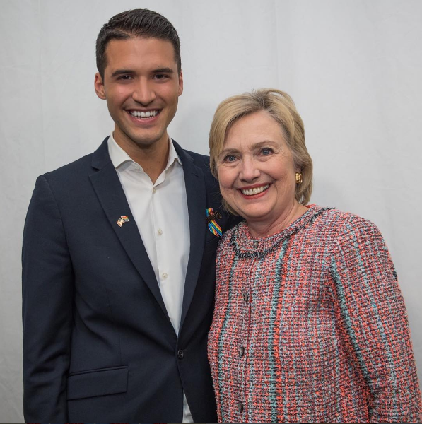 Raymond Braun with Hillary Clinton at Beautycon. (Photo: Instagram)