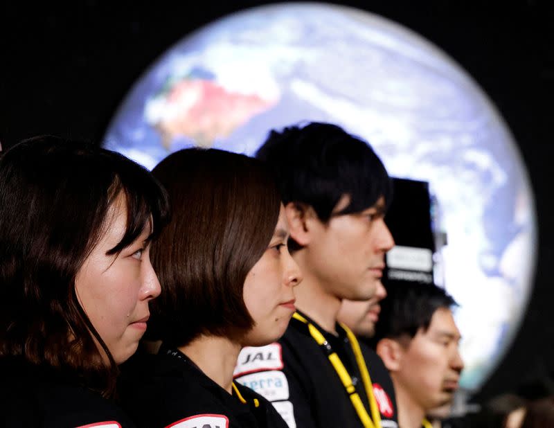 Employees of "ispace" react after the company announced they lost signal from the lander in HAKUTO-R lunar exploration program on the Moon at a venue to watch its landing in Tokyo