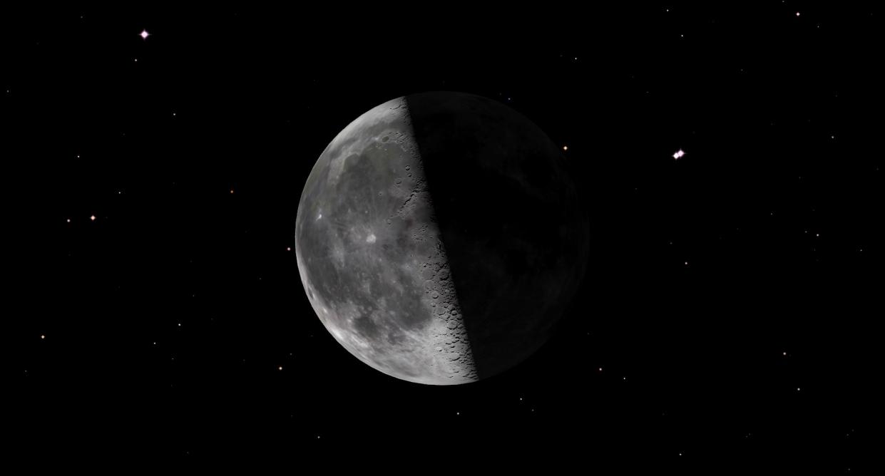  July 09, 2023 at 9:48 pm EDT - Third Quarter Moon in a starry black sky 