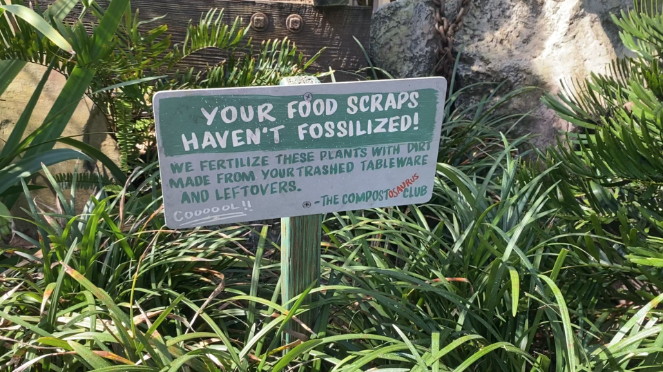 Signage explains how food scraps are reused at Restaurantosauros in Disney's Animal Kingdom.