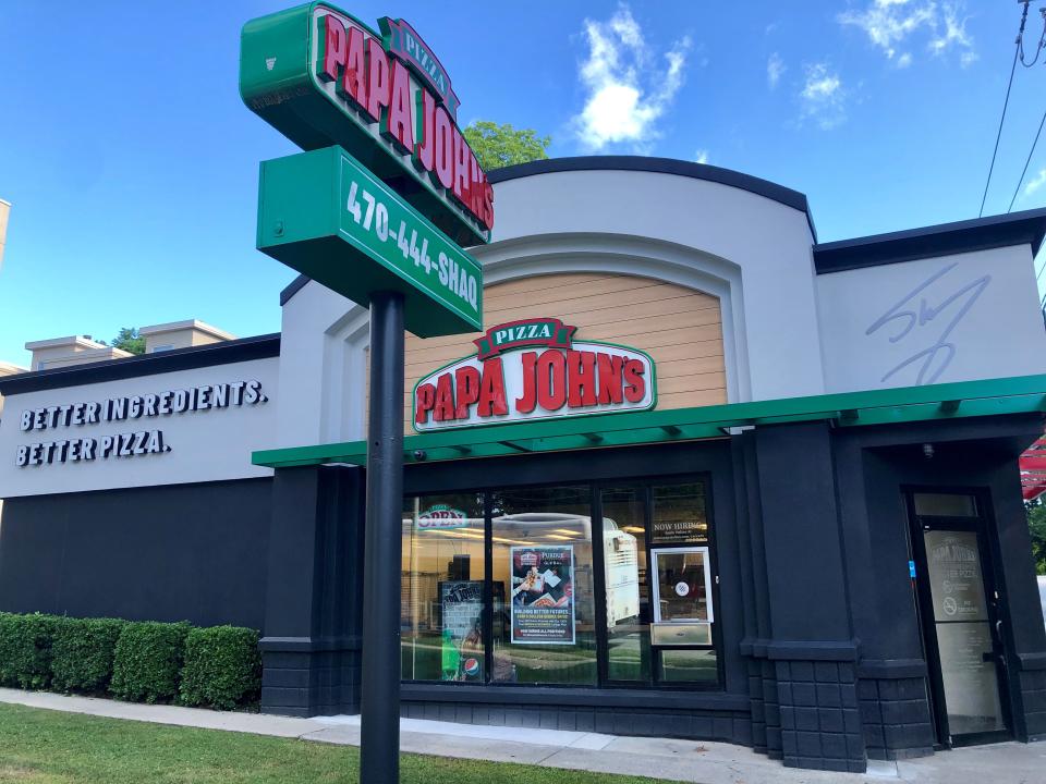 Remodeled Papa John's storefront with Shaquille O'Neal branding