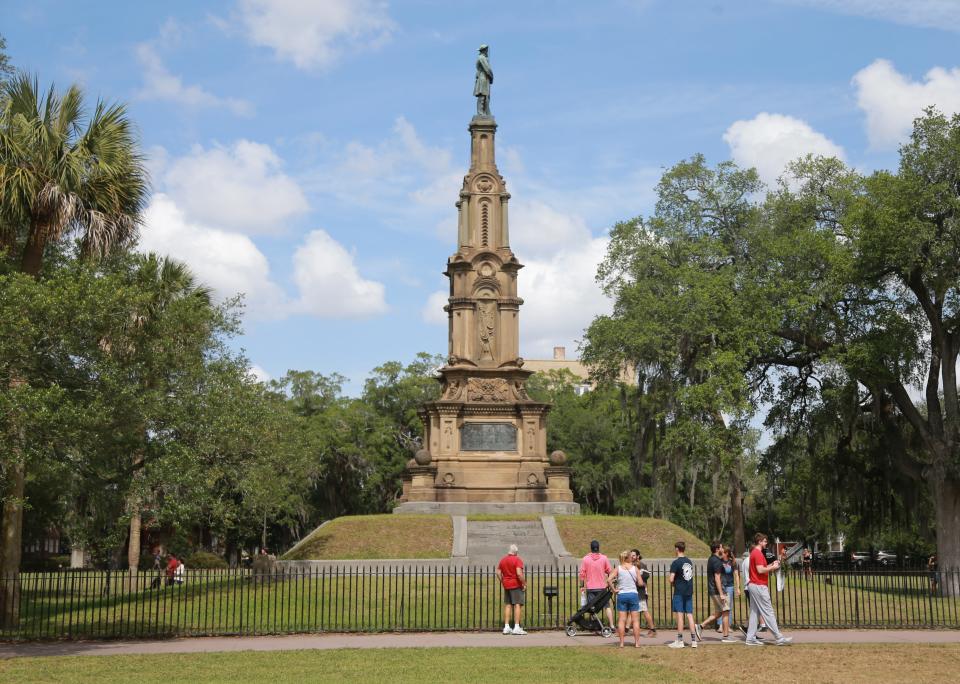 Visitors gather near the Confederate statute in Forsyth Park.