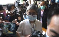 Pro-democracy activist and barrister Margaret Ng arrives at a court in Hong Kong Friday, April 16, 2021. Seven of Hong Kong’s leading pro-democracy advocates, including 82-year-old veteran activist Martin Lee and pro-democracy media tycoon Jimmy Lai, are expected to be sentenced Friday for organizing a march during the 2019 anti-government protests that triggered an overwhelming crackdown from Beijing.(AP Photo/Kin Cheung)