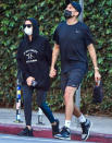 <p>Ashley Benson and boyfriend G-Eazy walk hand-in-hand as they make their way through L.A. on Wednesday.</p>