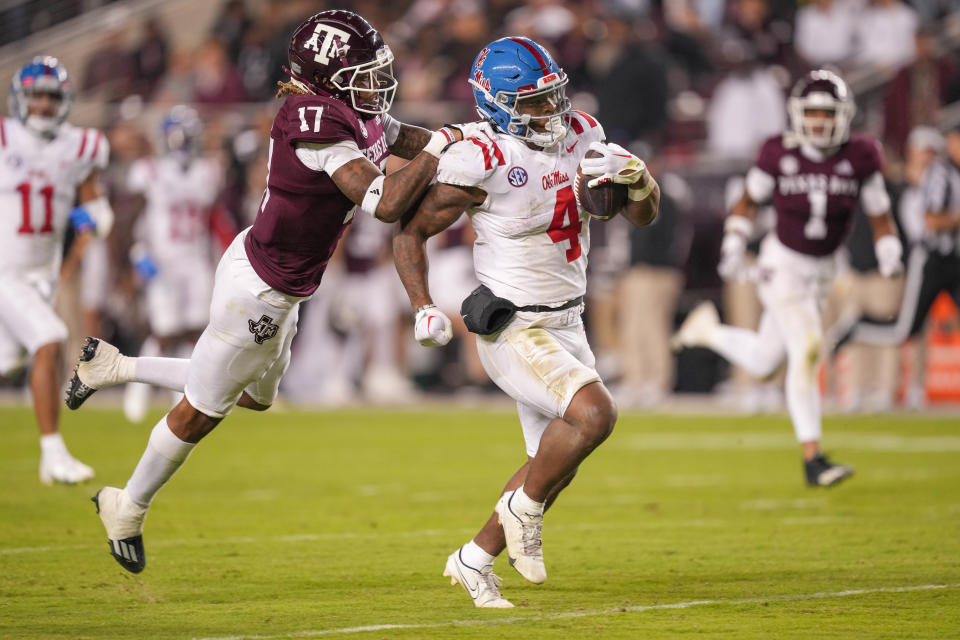 Oct 29, 2022; College Station, Texas; Texas A&M Aggies defensive back Jaylon Jones (17) tackles Mississippi Rebels running back Quinshon Judkins (4) in the second half at Kyle Field. Daniel Dunn-USA TODAY Sports