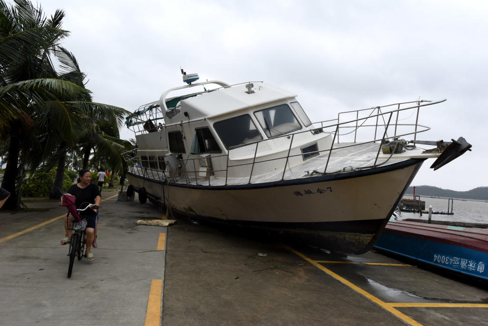 <p>A yacht is swept from the sea onto land in Zhuhai, south China’s Guangdong Province, Aug. 23, 2017. (Photo: Lu Hanxin/Xinhua via ZUMA Wire) </p>