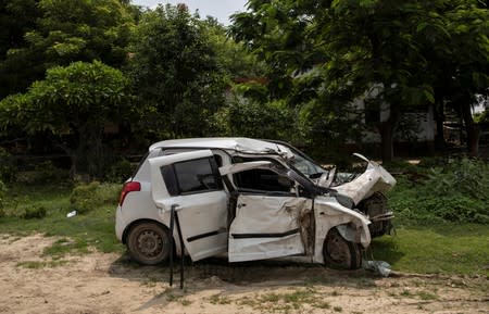 The damaged car involved in a highway collision in which a woman who is fighting a rape case against a legislator of the ruling Bharatiya Janata Party (BJP) was critically injured, is seen at a police station near Raebareli