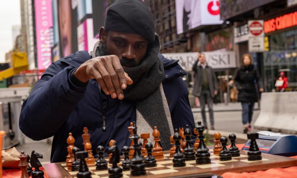 <span>Tunde Onakoya’s record-breaking feat took place in Times Square, New York.</span><span>Photograph: Yuki Iwamura/AP</span>