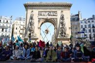 Extinction Rebellion activists hold protest in Paris, urging presidential candidates to act on climate change