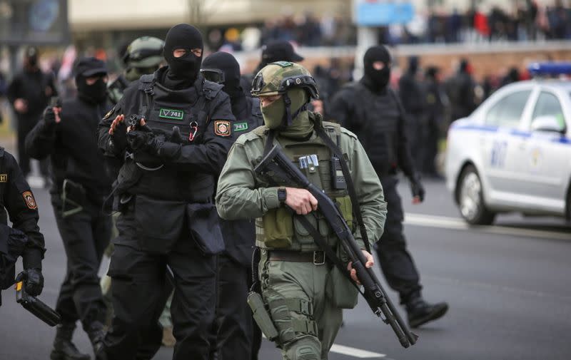 Belarusian opposition supporters hold a rally in Minsk