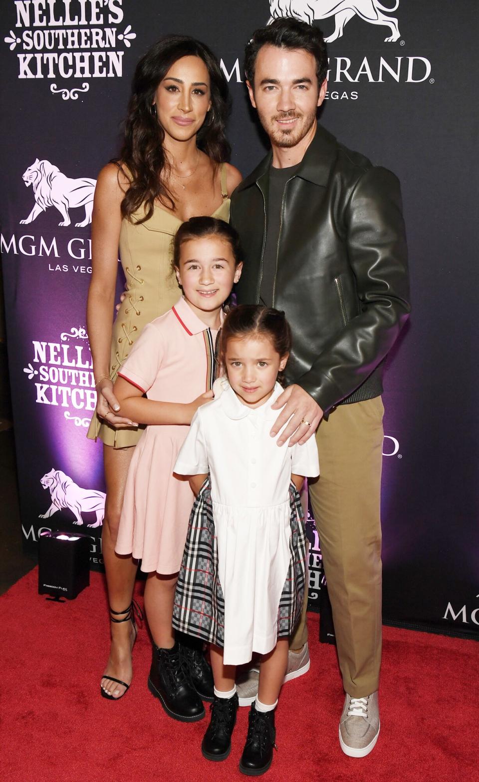 Danielle Jonas, Kevin Jonas, Alena Rose Jonas and Valentina Angelina Jonas arrive at the grand opening of their family restaurant Nellie's Southern Kitchen at MGM Grand on June 04, 2022 in Las Vegas, Nevada