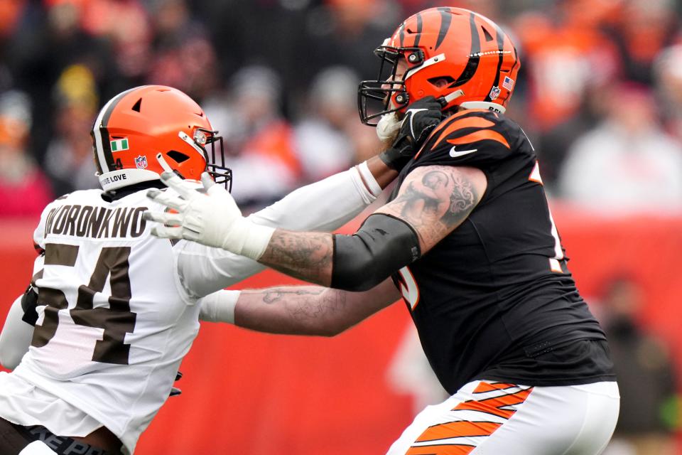 Cincinnati Bengals offensive tackle Jonah Williams (73) blocks Cleveland Browns defensive end Ogbo Okoronkwo (54) in the first quarter Sunday in Cincinnati.