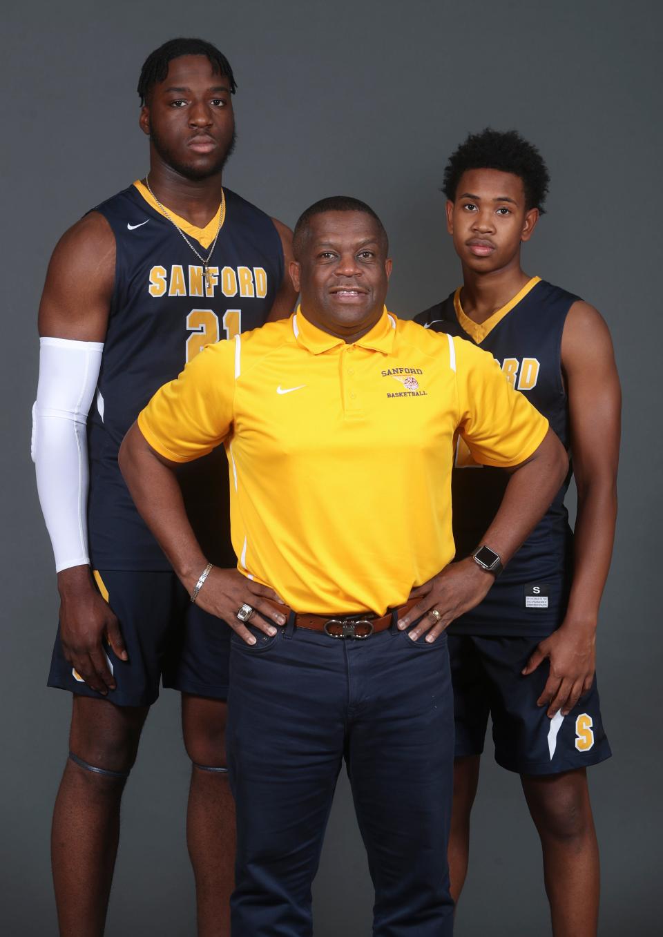 Sanford's (from left) Nnanna Njoku, coach Stan Waterman and Corey Perkins during the News Journal / delawareonline.com high school basketball media day at the 76ers Fieldhouse.