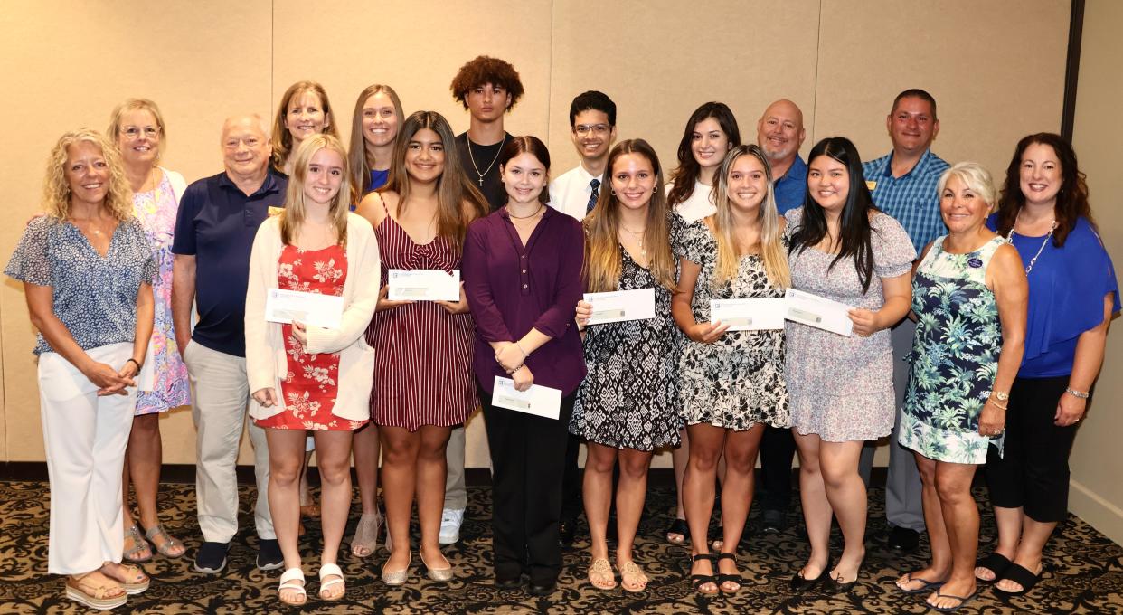 Front row: Students Aubrey Hunter, left, Jessica Alvarenga Zelaya, Alexandra McDowell, Riley Highfield, Kiersten Rau and Kasey-Huong Nguyen, and Scholarship Committee member Tina Springer. Back row, committee members Kim LeBlanc, left, Terese Duelge, Co-Chair Howard Parkin and Katrina Moyer, and students Leah Bartlett, Larry Shannon, Christian Mendez and Madelyn Crouch. Committee members Co-Chair Mark Rawlinson, J.D. Flaig and Heidi Lionetti.