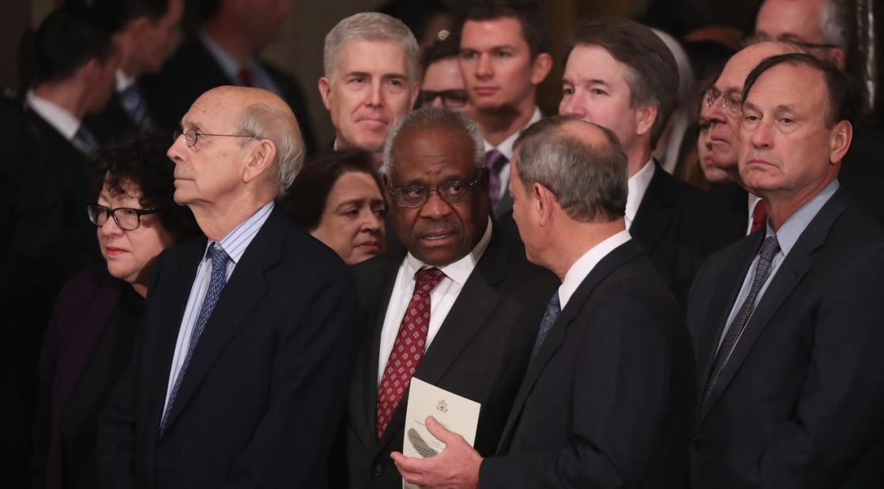 <span class="caption">Justices of the U.S. Supreme Court on December 3, 2018, in Washington.</span> <span class="attribution"><a class="link " href="https://www.gettyimages.com/detail/news-photo/justices-of-the-u-s-supreme-court-including-associate-news-photo/1068166706?adppopup=true" rel="nofollow noopener" target="_blank" data-ylk="slk:Jonathan Ernst-Pool/Getty Images;elm:context_link;itc:0;sec:content-canvas">Jonathan Ernst-Pool/Getty Images</a></span>