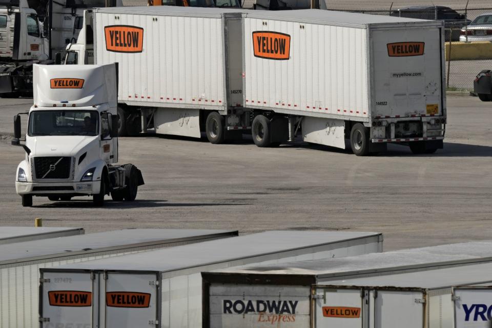 Yellow Corp. trucks are seen at a YRC Freight terminal Friday, July 28, 2023, in Kansas City, Mo. After years of financial struggles, Yellow is reportedly preparing for bankruptcy and seeing customers leave in large numbers — heightening risk for future liquidation. While no official decision has been announced by the company, the prospect of bankruptcy has renewed attention around Yellow's ongoing negotiations with unionized workers, a $700 million pandemic-era loan from the government and other bills the trucker has racked up over time. (AP Photo/Charlie Riedel)