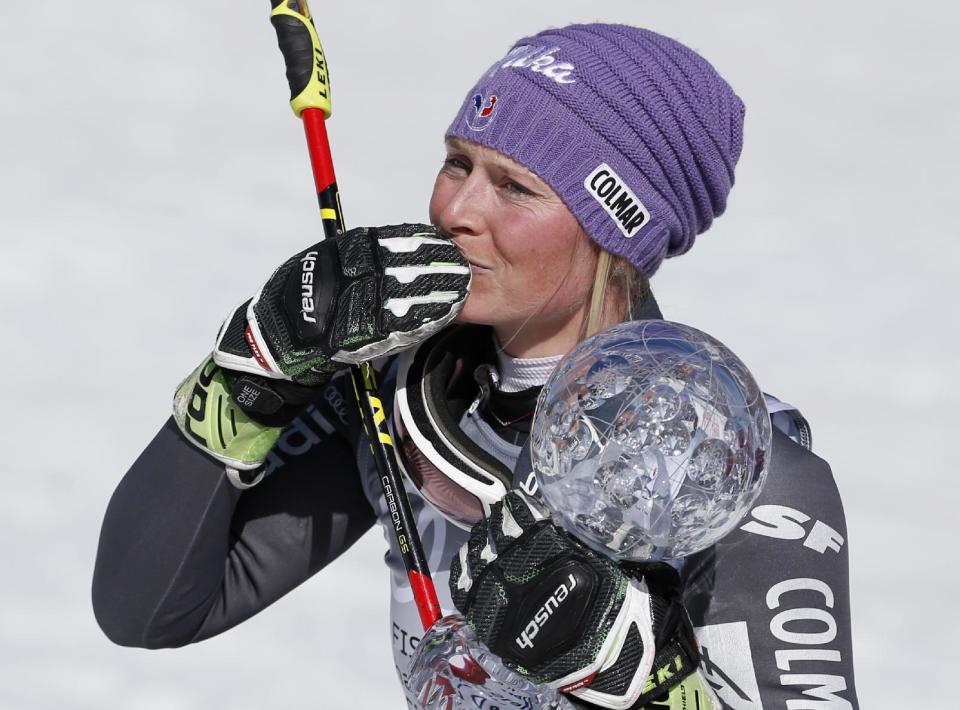World Cup women's giant slalom overall champion France's Tessa Worley blows a kiss to the crowd after a women's World Cup giant slalom ski race Sunday, March 19, 2017, in Aspen, Colo. (AP Photo/Brennan Linsley)