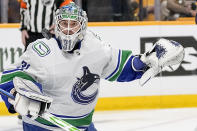 Vancouver Canucks goaltender Arturs Silovs (31) blocks a shot on goal against the Nashville Predators during the second period in Game 4 of an NHL hockey Stanley Cup first-round playoff series Sunday, April 28, 2024, in Nashville, Tenn. (AP Photo/George Walker IV)