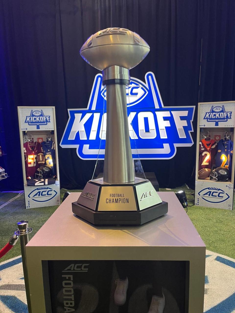 ACC Football Championship trophy on display at the 2023 ACC Kickoff in Charlotte, NC