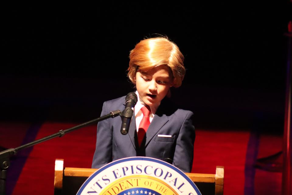 Kate Fuller, AKA Donald Trump, was among All Saints Episcopal School students who played a role in this year's Hall of Presidents Friday.