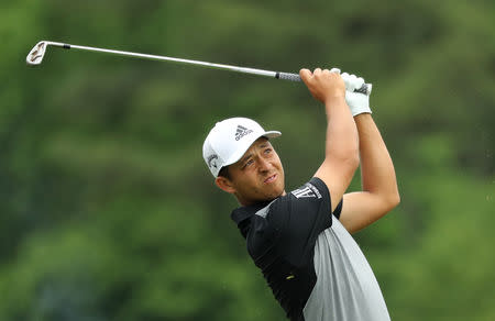 Golf - Masters - Augusta National Golf Club - Augusta, Georgia, U.S. - April 14, 2019. Xander Schauffele of the U.S. in action on the 12th hole during final round play. REUTERS/Lucy Nicholson