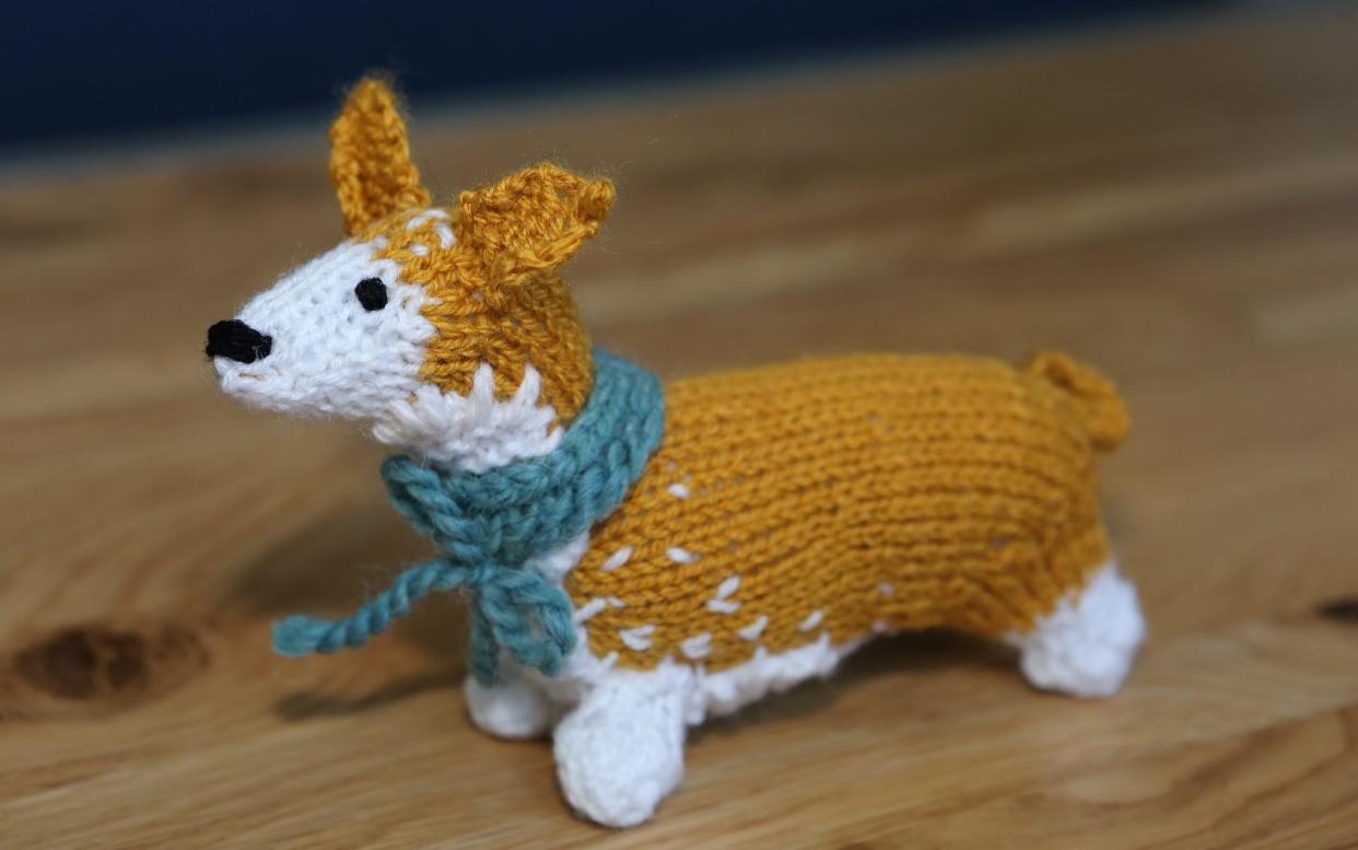 WI members ark being asked to knit toy corgis and hide them across the country - Melissa Page