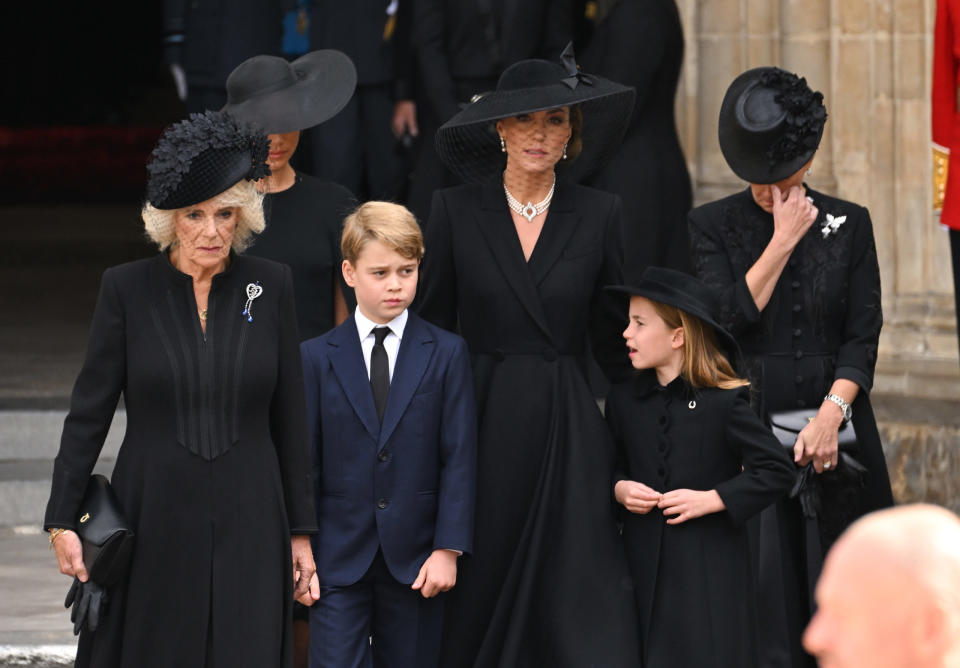 LONDON, ENGLAND – SEPTEMBER 19: (L-R) Camilla, Queen Consort, Prince George of Wales, Catherine, Princess of Wales, Princess Charlotte of Wales and Sophie, Countess of Wessex during the State Funeral of Queen Elizabeth II at Westminster Abbey on September 19, 2022 in London, England. Elizabeth Alexandra Mary Windsor was born in Bruton Street, Mayfair, London on 21 April 1926. She married Prince Philip in 1947 and ascended the throne of the United Kingdom and Commonwealth on 6 February 1952 after the death of her Father, King George VI. Queen Elizabeth II died at Balmoral Castle in Scotland on September 8, 2022, and is succeeded by her eldest son, King Charles III. (Photo by Karwai Tang/WireImage)