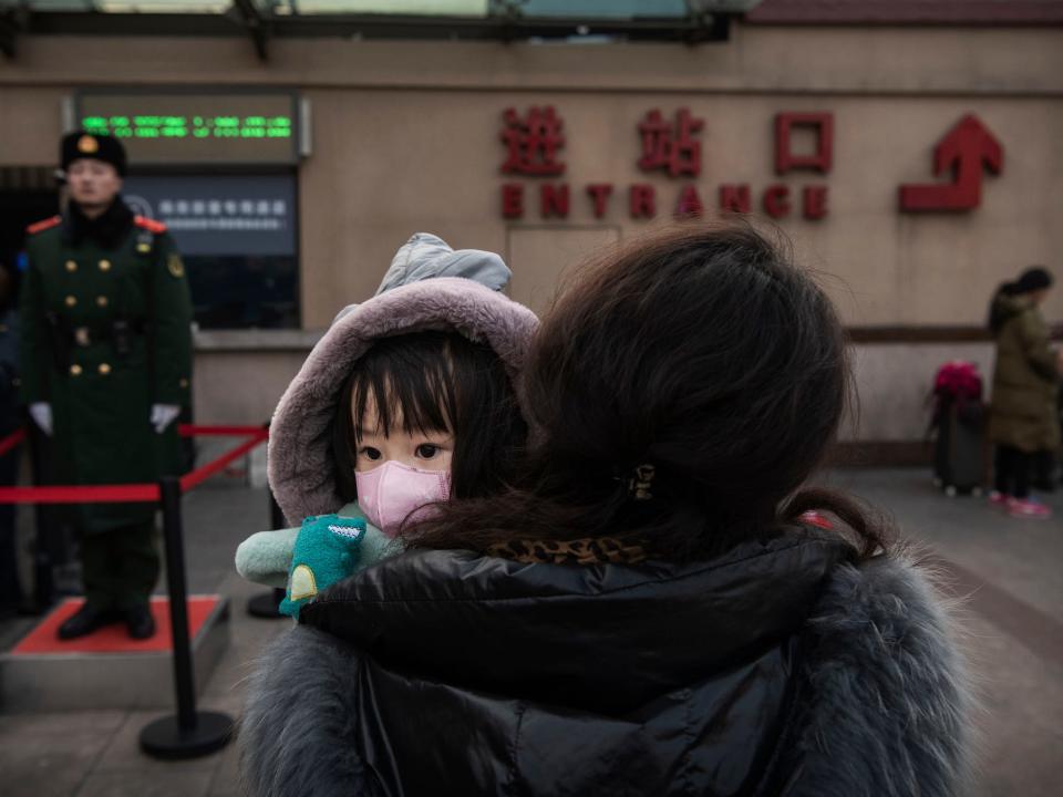 Wuhan virus China Beijing railway station