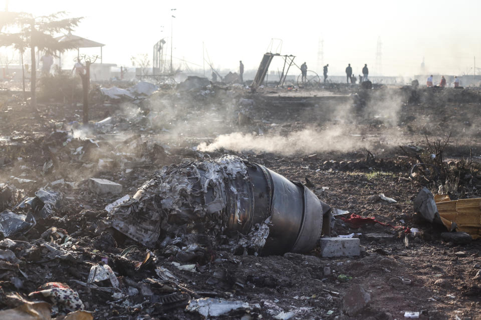 08 January 2020, Iran, Shahedshahr: Debris of an aircraft lay at the scene, where a Ukrainian airplane carrying 176 people crashed on Wednesday shortly after takeoff from Tehran airport, killing all onboard. Photo: Mahmoud Hosseini/dpa (Photo by Mahmoud Hosseini/picture alliance via Getty Images)