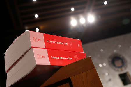 Copies of tax legislation are seen during a markup on the "Tax Cuts and Jobs Act" on Capitol Hill in Washington, U.S., November 15, 2017. REUTERS/Aaron P. Bernstein