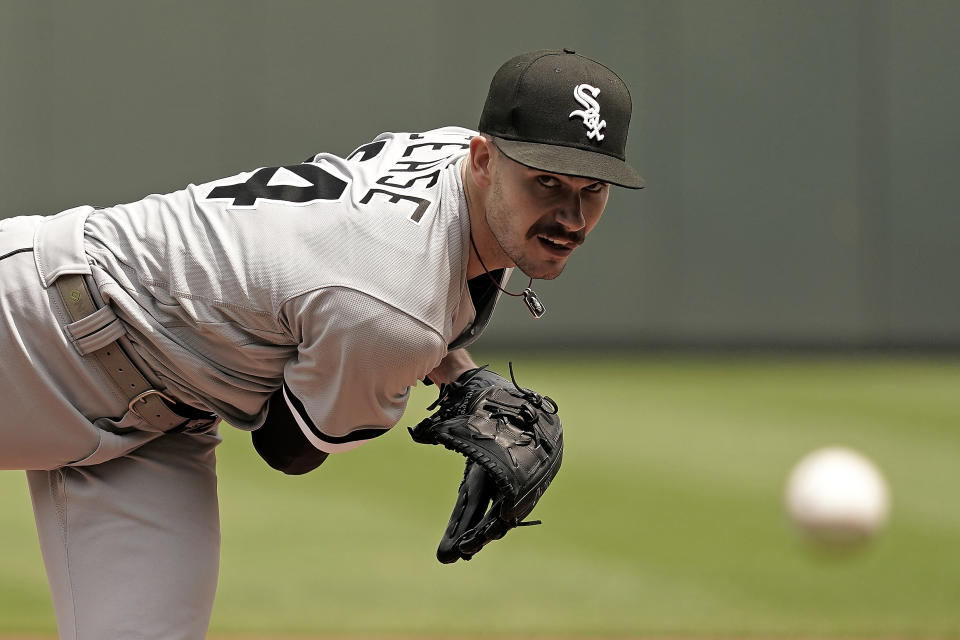 Chicago White Sox starting pitcher Dylan Cease throws during the first inning in the first game of a baseball doubleheader against the Kansas City Royals Tuesday, May 17, 2022, in Kansas City, Mo. (AP Photo/Charlie Riedel)