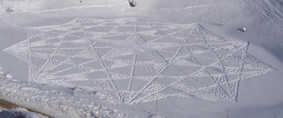 Snow art crop circles by Simon Beck