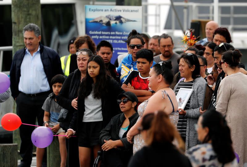 Relatives wait for rescue mission, following the White Island volcano eruption in Whakatane