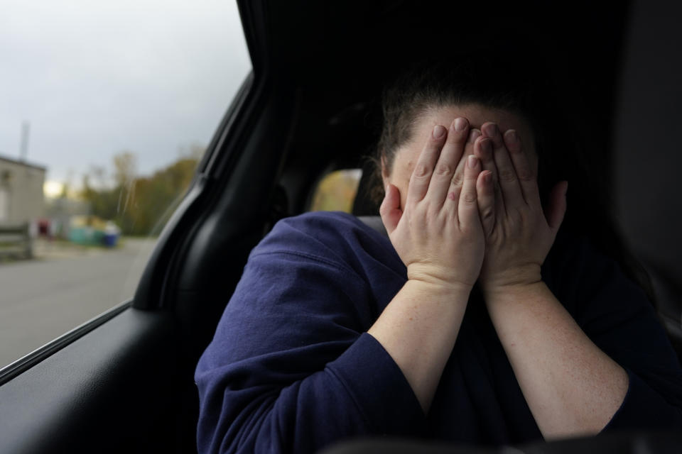Heather Jarvis reacts in the back seat of a vehicle after being released from Ohio Reformatory for Women, in Marysville, Ohio, Wednesday, Oct. 25, 2023. Jarvis is part of the fastest-growing prison population in the country, one of more than 190,000 women held in some form of confinement in the United States as of this year. Their numbers grew by more than 500% between 1980 and 2021. (AP Photo/Carolyn Kaster)
