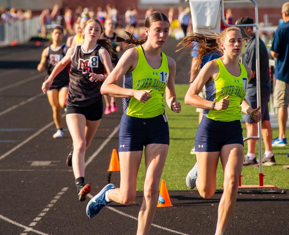 River Valley's Emma Hawk, left, and Catherine Starrs run in the girls 800 meters at the Mid Ohio Athletic Conference  Track and Field Championships at Harding Stadium last week.