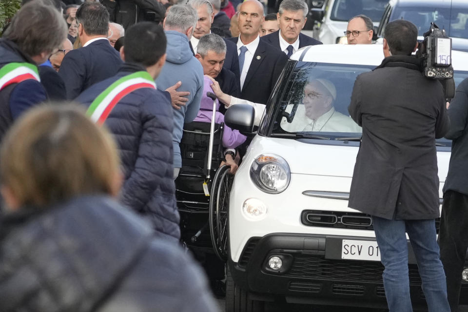 Pope Francis is cheered by faithful upon his arrival in San Carlo, near Asti, Italy, Saturday, No. 19, 2022. The Pontiff returned to his father's birthplace in northern Italy on Saturday for the first time since ascending the papacy to celebrate the 90th birthday of a second cousin who long knew him as simply "Giorgio." (AP Photo/Gregorio Borgia)