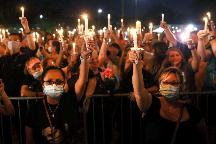 Fans of Elvis Presley attend the annual candlelight vigil outside his home at Graceland on Aug. 15, 2021, with a remembrance that leads into the anniversary of his death on Aug. 16, 1977. This year's vigil starts at 8:30 p.m. Monday at the Gates of Graceland.