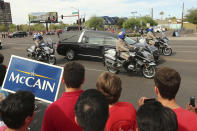 <p>People line the street as the hearse carrying Sen. John McCain, R-Ariz., makes it’s way to a memorial service at North Phoenix Baptist Church, Thursday, Aug. 30, 2018, in Phoenix. (Photo: Ralph Freso/AP) </p>