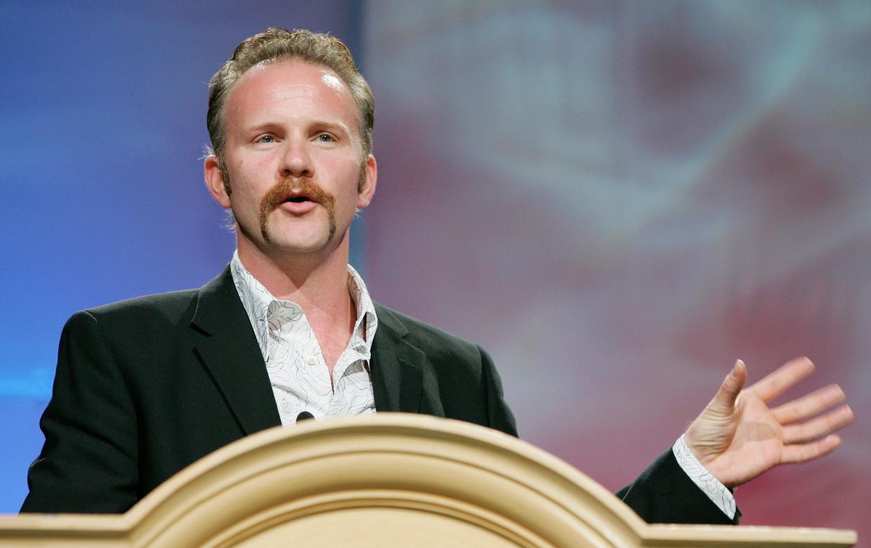 Filmmaker Morgan Spurlock accepts the award for Documentary Title of the Year for the movie "Super Size Me" at the Video Software Dealers Association's award show at the organization's annual home video convention at the Bellagio July 27, 2005 Las Vegas.