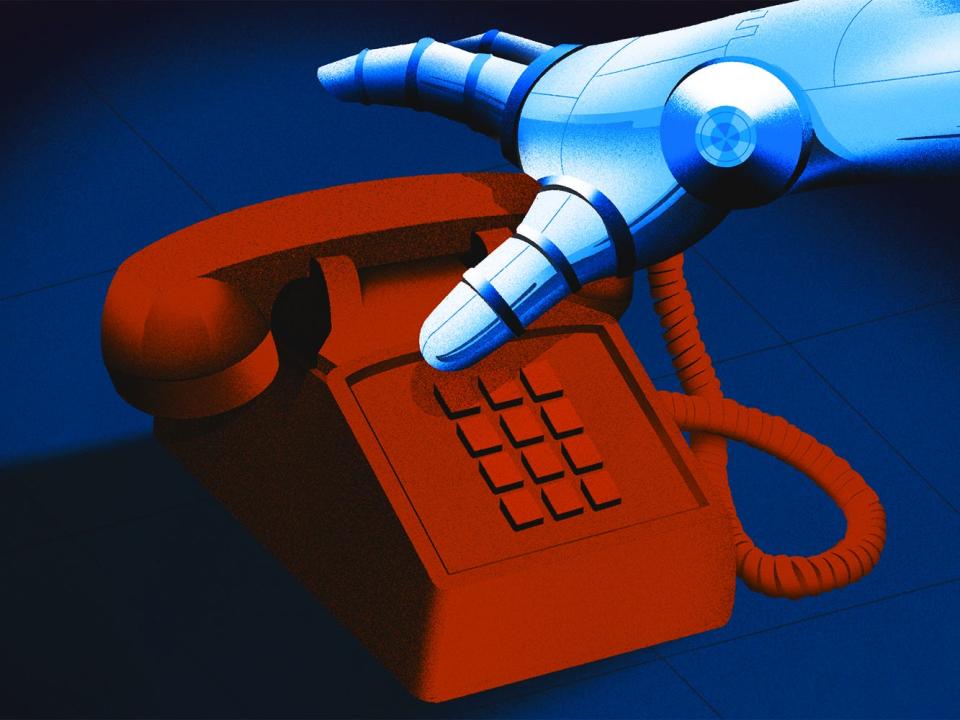 A robot hand reaching for a red landline phone