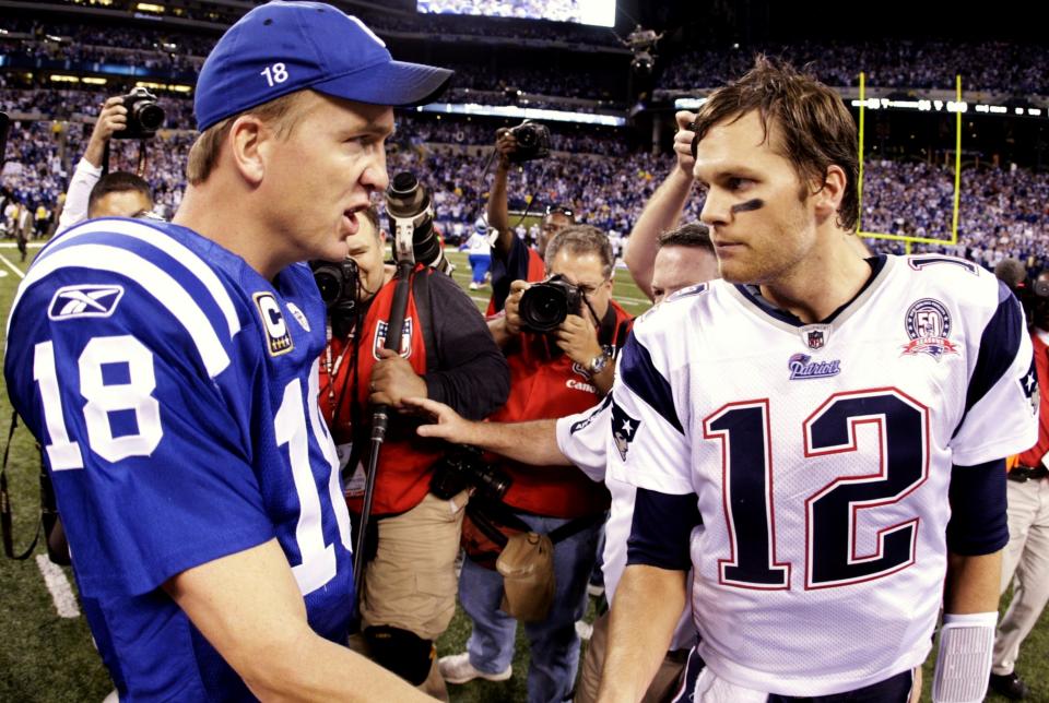 Peyton Manning and Tom Brady are no strangers to verbal sparring. (Photo by Jamie Squire/Getty Images)