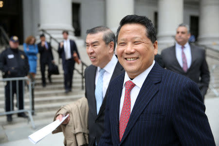 Macau billionaire real estate developer Ng Lap Seng (R), accused of bribing former United Nations General Assembly president John Ashe, exits the Manhattan U.S. District Courthouse in New York, U.S. April 7, 2017. REUTERS/Ashlee Espinal