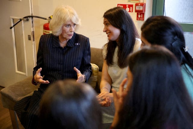 Camilla at women's refuge 