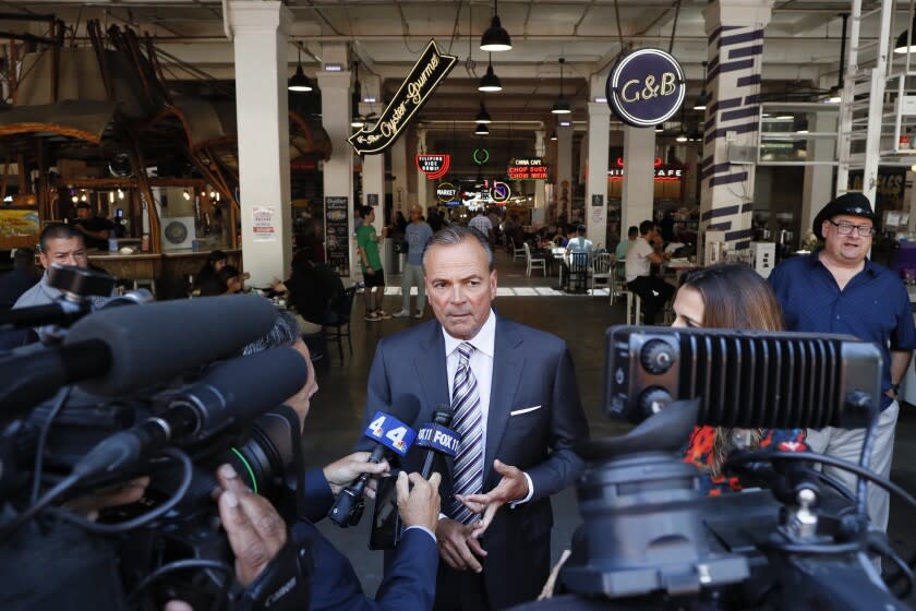 Los Angeles, CA, Thursday, June 2, 2022 - Rick Caruso tours Grand Central Market as he continues his campaign to become Mayor of LA. (Robert Gauthier/Los Angeles Times)