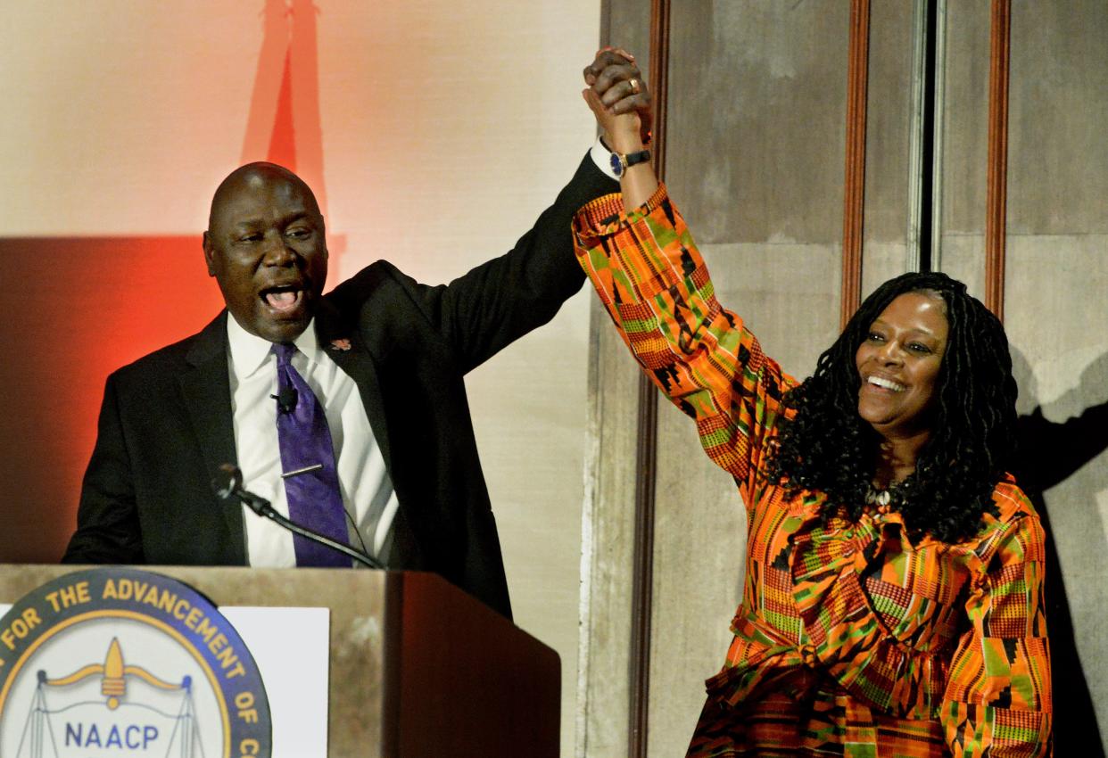 Nationally-known civil rights attorney Ben Crump, left, and president of the Springfield branch of the NAACP and its state director Teresa Haley appear on stage together during the 102nd Annual Lincoln-Douglass Freedom Fund Banquet Sunday Feb. 19, 2023 at the Crowne Plaza Hotel.