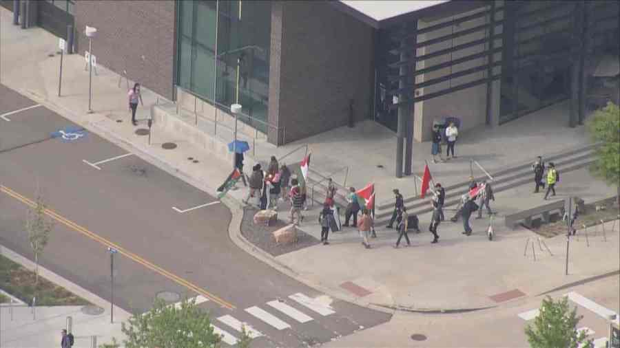Auraria Campus was placed on lockdown on Monday afternoon as police responded to the area, which has been the site of pro-Palestine protests for weeks. SkyFOX took these images of protestors outside the building on May 13, 2024.