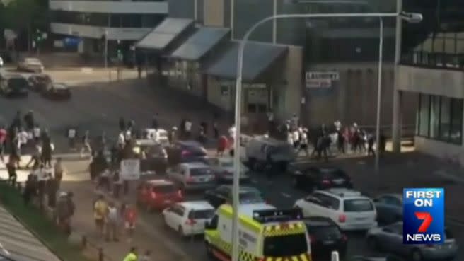 The brawl spilled on the the streets of the CBD, leaving traffic in a standstill. Photo: 7News