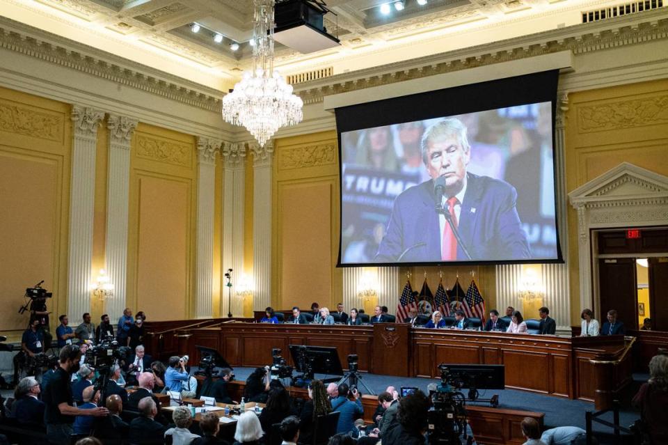 An image of former President Donald Trump is displayed as the House select committee investigating the Jan. 6 attack on the U.S. Capitol continues to reveal its findings of a year-long investigation, at the Capitol in Washington, Tuesday, June 21, 2022. On June 23, the Jan. 6 committee will hear from former Justice Department officials who faced down a relentless pressure campaign from Donald Trump over the presidential election results. (Al Drago/Pool Photo via AP)