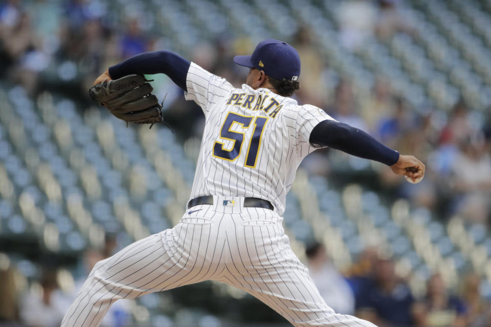 Milwaukee Brewers' Freddy Peralta pitches during the first inning of the team's baseball game against the Arizona Diamondbacks on Friday, June 4, 2021, in Milwaukee. (AP Photo/Aaron Gash)