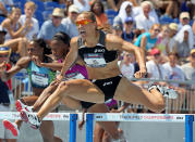 DES MOINES, IA - JUNE 26: Lolo Jones clears a hurdle on the way to victory in the Womens 100 Meter Hurdles during the 2010 USA Outdoor Track & Field Championships at Drake Stadium on June 26, 2010 in Des Moines, Iowa. (Photo by Andy Lyons/Getty Images)